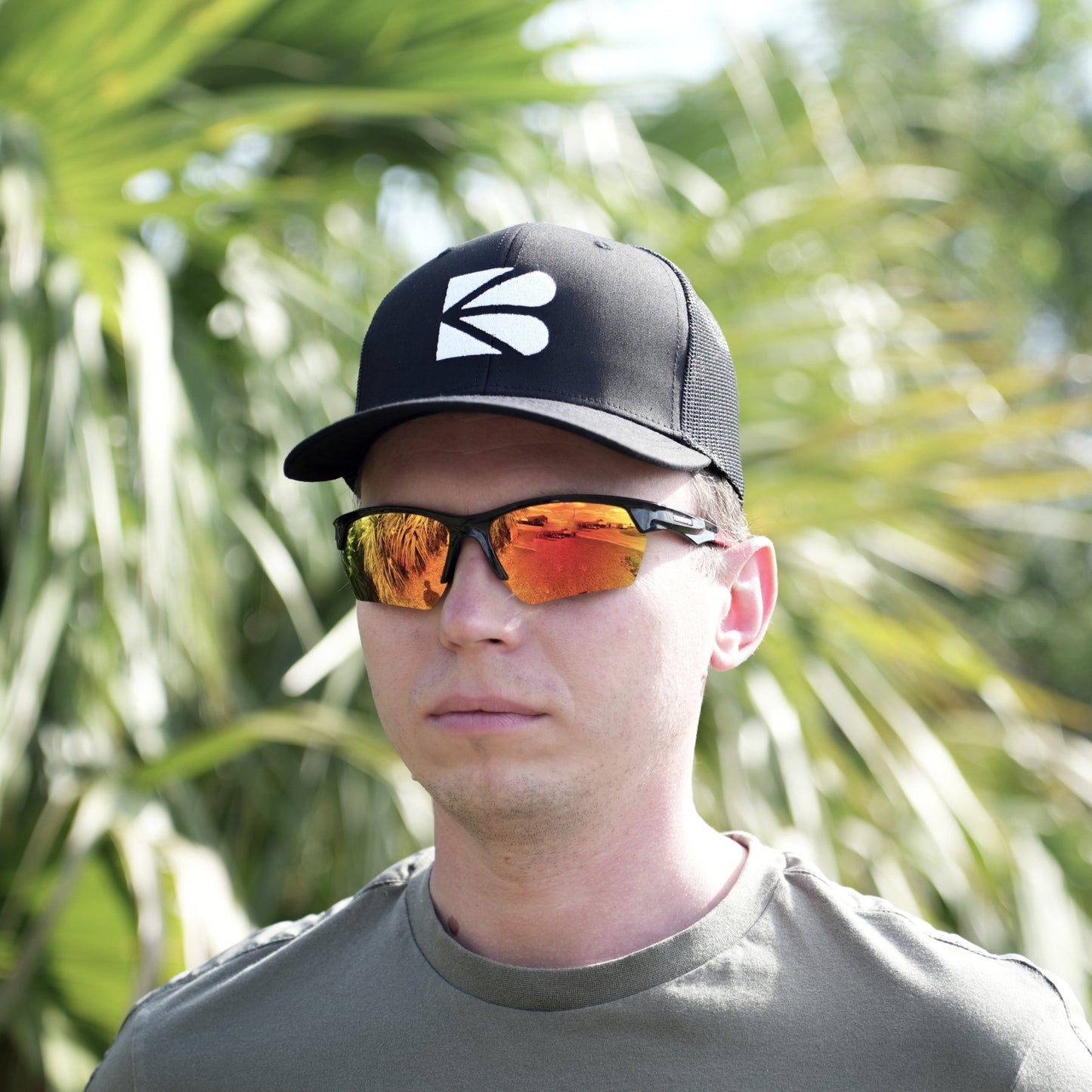 Black Trucker Cap – Classic Mesh-Back Hat with Embroidered Logo